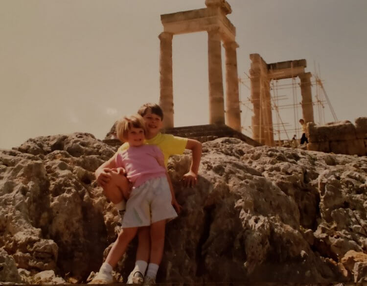 An old photo of a little girl and her brother in Athens, Greece