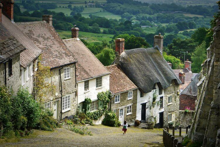 Photo of an English town looking down the hill.