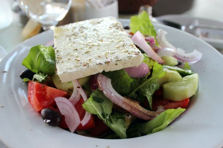 Greek Salad with a large block of Feta.